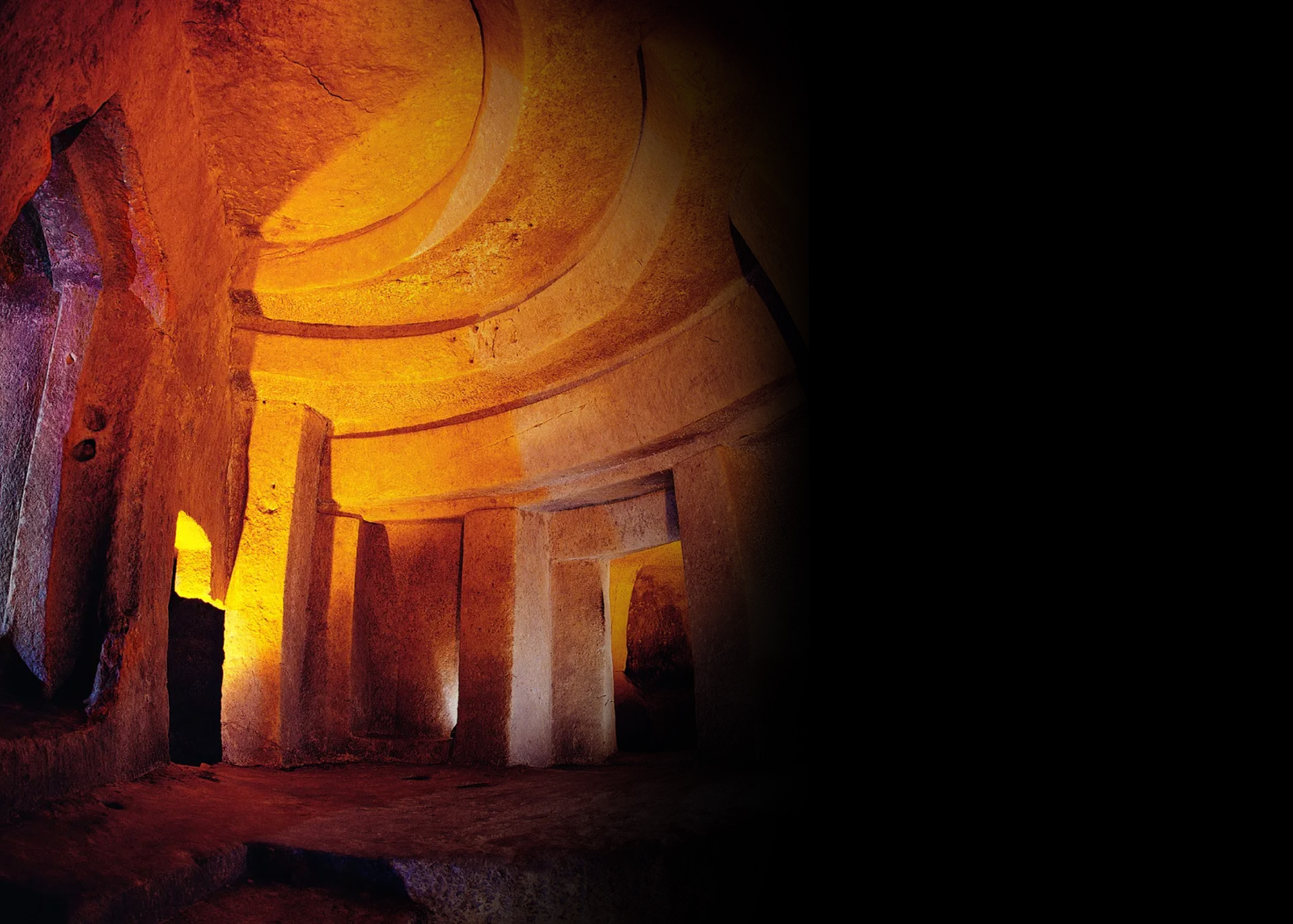 Cave in Casa Bonavita lit with a yellow light