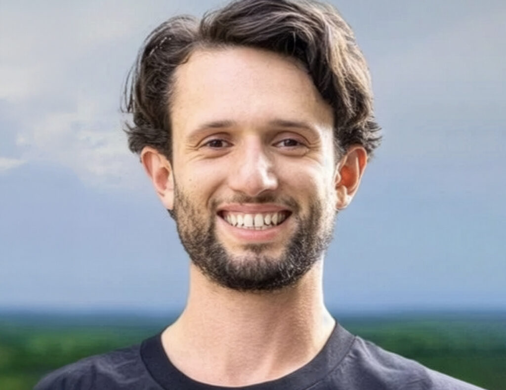 A headshot of Tai Chi teacher and Taoism communicator George Thompson smiling
